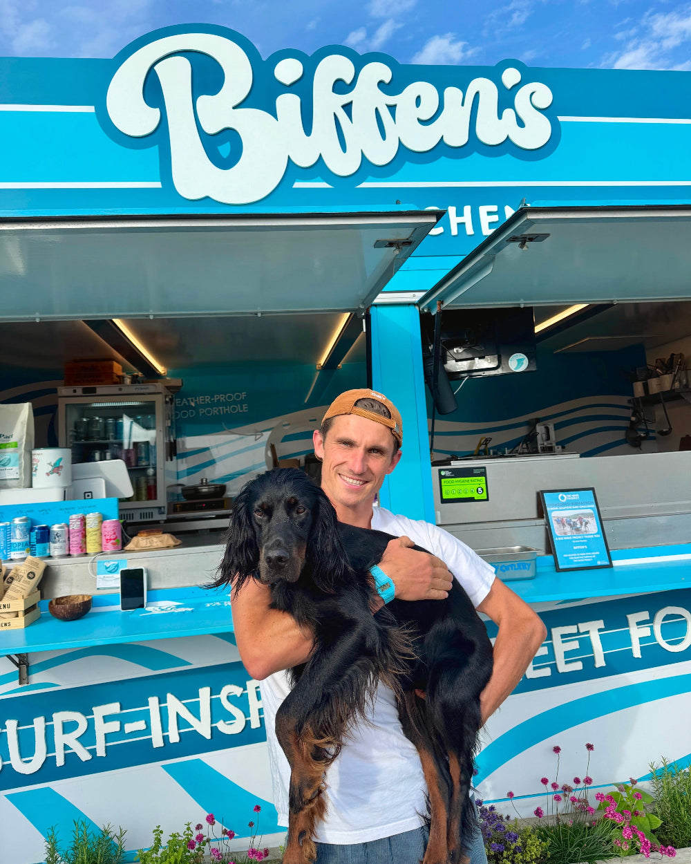 biff and his dog taco outside the food truck